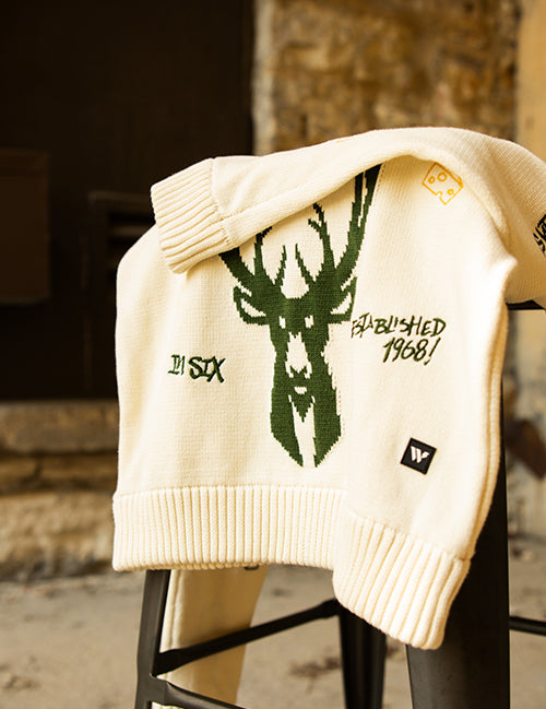 Bucks In Six x The Wild Collective All Over Print Jacquard Milwaukee Bucks Crewneck Sweatshirt-on stool
