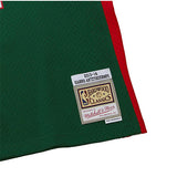 Mitchell & Ness HWC '13 Giannis Antetokounmpo Milwaukee Bucks Swingman jersey In Green, Red & White - Zoom View On Left Hip HWC Tag