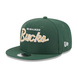 Youth New Era Script 9FIfty Milwaukee Bucks Snapback Hat in Green - Angled Left Side View