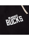 Standard Issue Slacker Wordmark Milwaukee Bucks Pants In Black - Right Thigh Logo View