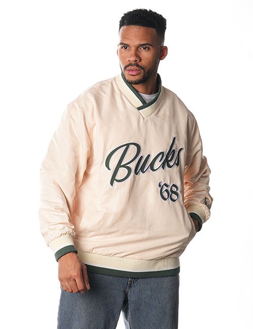 The Wild Collective Wordmark Milwaukee Bucks Windbreaker Pullover-male model