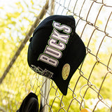 Mitchell & Ness HWC '93 Playmaker Milwaukee Bucks Adjustable Hat-on fence