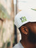 Bucks In Six New Era 9Fifty Irish Icon Milwaukee Bucks Snapback Hat In White & Green - Right Side View On Model
