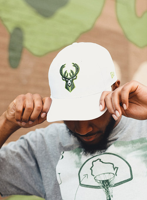Bucks In Six New Era 9Fifty Irish Icon Milwaukee Bucks Snapback Hat In White & Green - Front View On Model