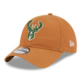 New Era Icon 9Twenty Bronze Milwaukee Bucks Adjustable Hat in Tan - Angled Left Side View