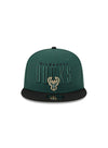 New Era 9Fifty Headline 2-Tone Milwaukee Bucks Snapback Hat in Green and Black - Front View