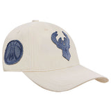 Pro Standard Varsity Blues Milwaukee Bucks Adjustable Hat in Cream - Angled Right Side View