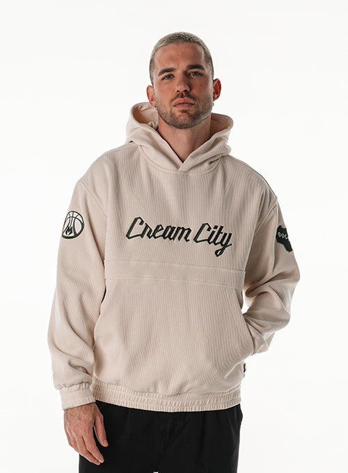 The Wild Collective 2025-26 City Edition Corduroy Milwaukee Bucks Hooded Sweatshirt-front