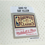Mitchell & Ness HWC '93 Energy Ray Allen Milwaukee Bucks Swingman Jersey in Cream, Purple, and Green - Zoom View Left Hip Tag