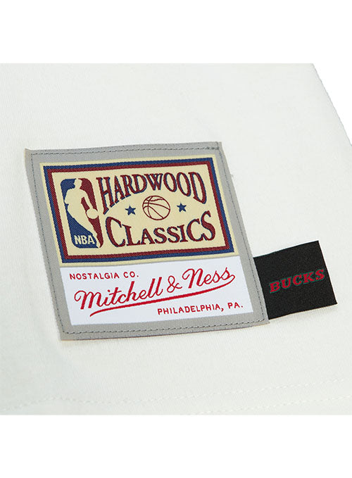 Mitchell & Ness '68 Energy Milwaukee Bucks T-Shirt in Cream - Zoom View Left Hip Tag