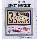 Mitchell & Ness HWC 1988 Sidney Moncrief Milwaukee Bucks Swingman Jersey In White & Green - Zoom View On Waist Tag