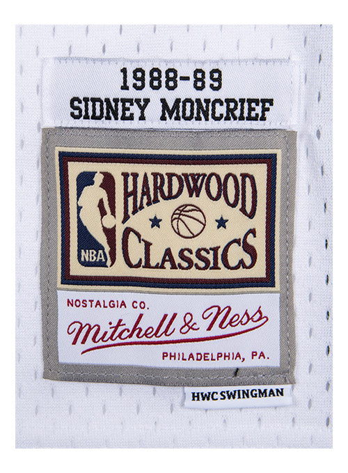 Mitchell & Ness HWC 1988 Sidney Moncrief Milwaukee Bucks Swingman Jersey In White & Green - Zoom View On Waist Tag