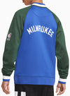 Nike 2022-23 City Edition Showtime Milwaukee Bucks Full Zip Bomber Jacket In Blue, Green & White - Back View On Model