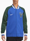 Nike 2022-23 City Edition Showtime Milwaukee Bucks Full Zip Bomber Jacket In Blue, Green & White - Front View On Model