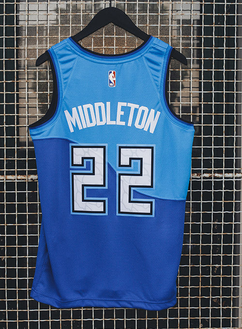 Nike Khris Middleton 2020-21 City Milwaukee Bucks Swingman Jersey In Blue - Back View On Hanger