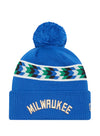 Youth New Era 2022-23 City Edition OTC Cuff Pom Milwaukee Bucks Knit Hat In Blue - Front View