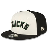 New Era 9Fifty 2022 Statement Wordmark Milwaukee Bucks Snapback Hat In Black & White - Angled Left Side View