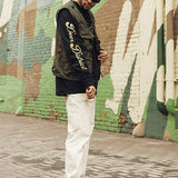 The Wild Collective Deer District Milwaukee Bucks Long Sleeve T-Shirt In Black - Right Side View On Model