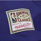 Mitchell & Ness HWC'93 Game Day Pattern Milwaukee Bucks Hooded Sweatshirt In Purple - Zoom View On Left Hip Tag